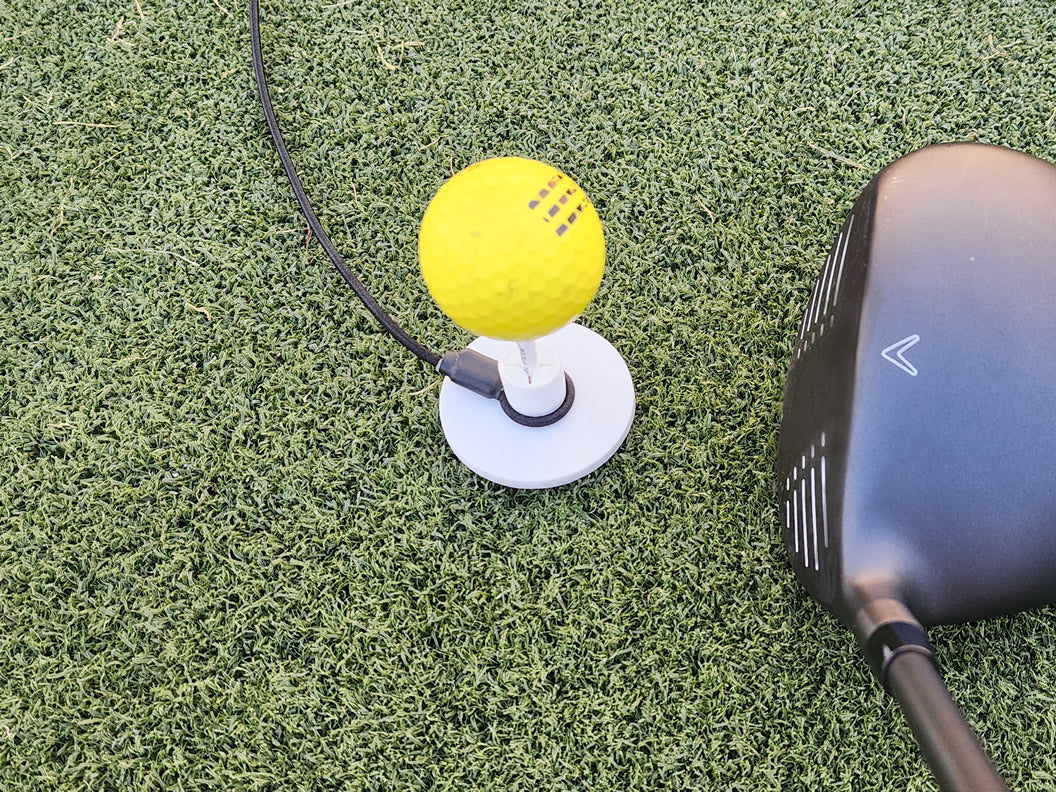 Tee Leashes — product demo video — full-speed and slow-motion swing demo on turf showing cord performance and tee stability