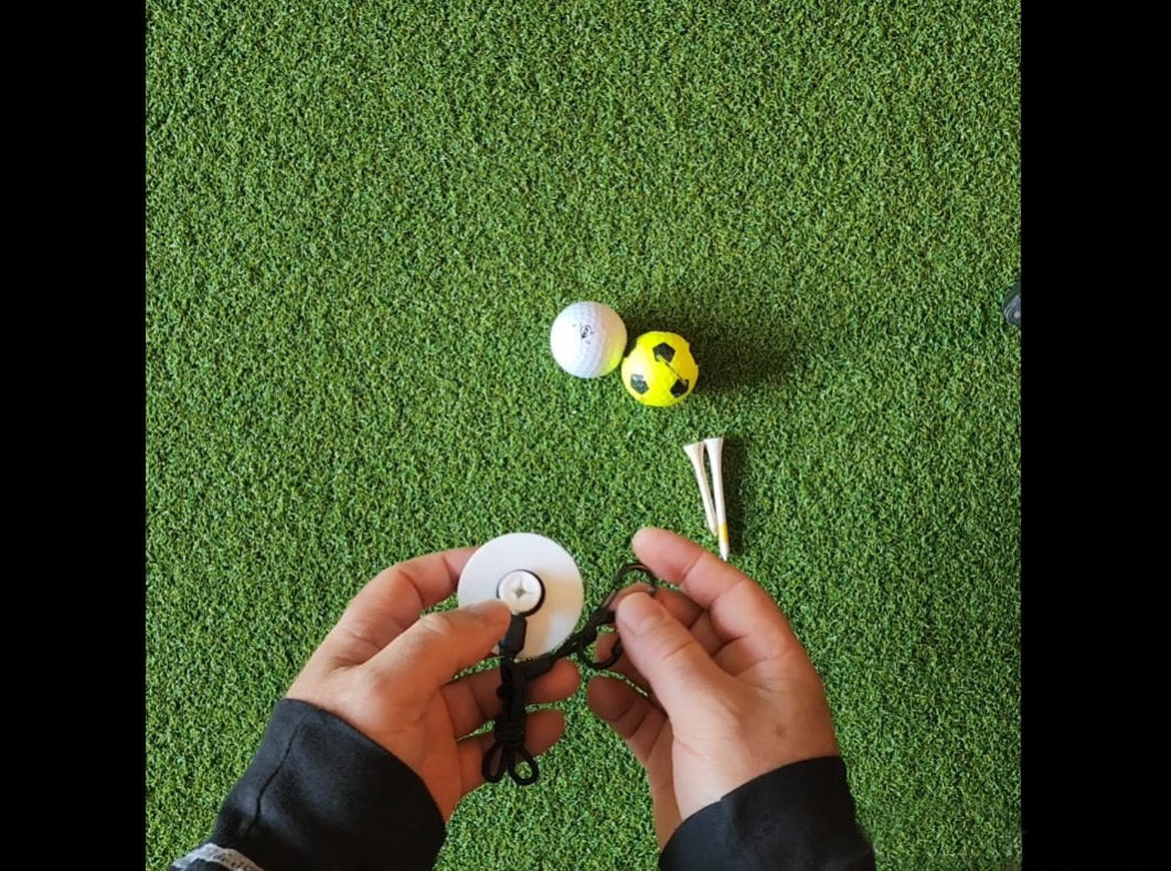 Tee Leashes — product demo video — golf unboxing showing clip removal and unravelling tether and setup demo on turf with tees and balls