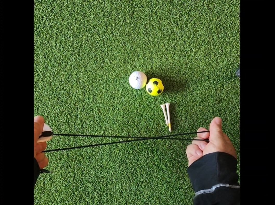 Tee Leashes — product demo video — golf cord stretch test demo on turf showing elasticity and durability on turf with tees and balls