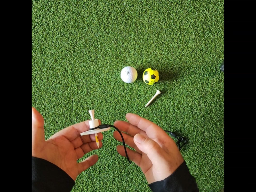 Tee Leashes — product demo video — golf tee height adjustment demo on turf using standard wooden tees with golf balls