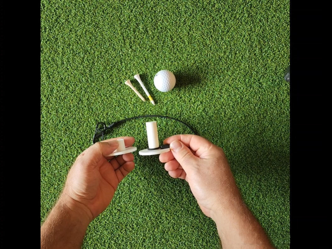 Tee Leashes — product demo video — golf rubber tee swap and leash length adjustment demo on turf showing customizable setup with tees and ball