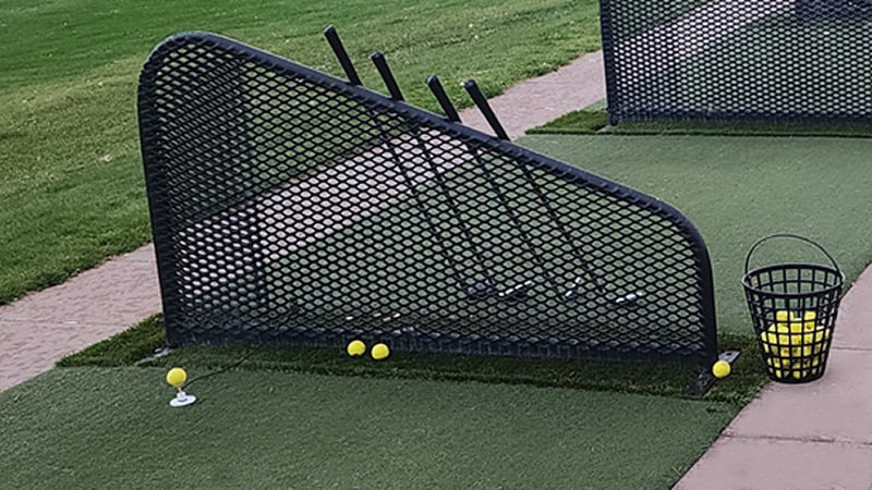 Tee Leashes — homepage hero image — range setup with golf tees and mat, with overlaid text “The Original TEE LEASH”